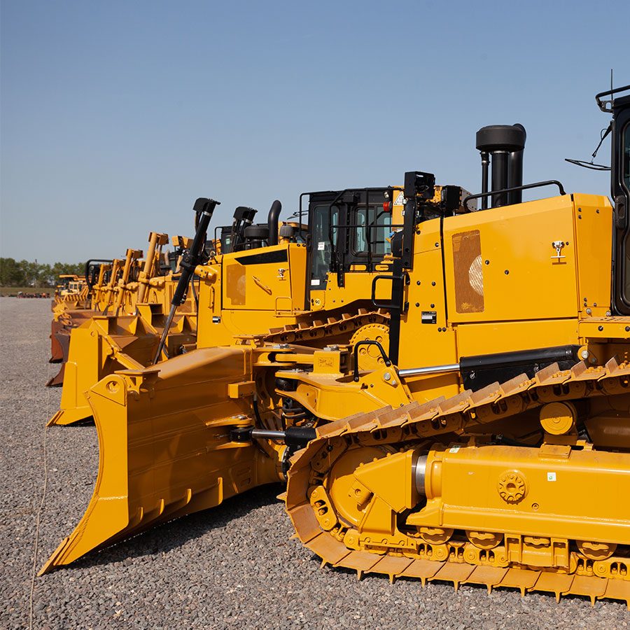 row of bulldozers in a construction site XCCMP2Q